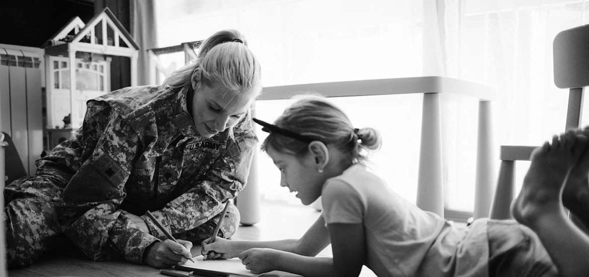 Army mom coloring with daughter